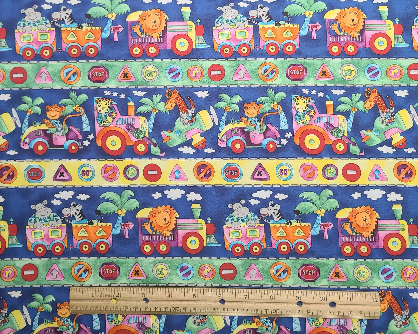 EOB - Hancock Fabrics - Brightly Colored Cartoon-Style Animal Train Border Print Fabric