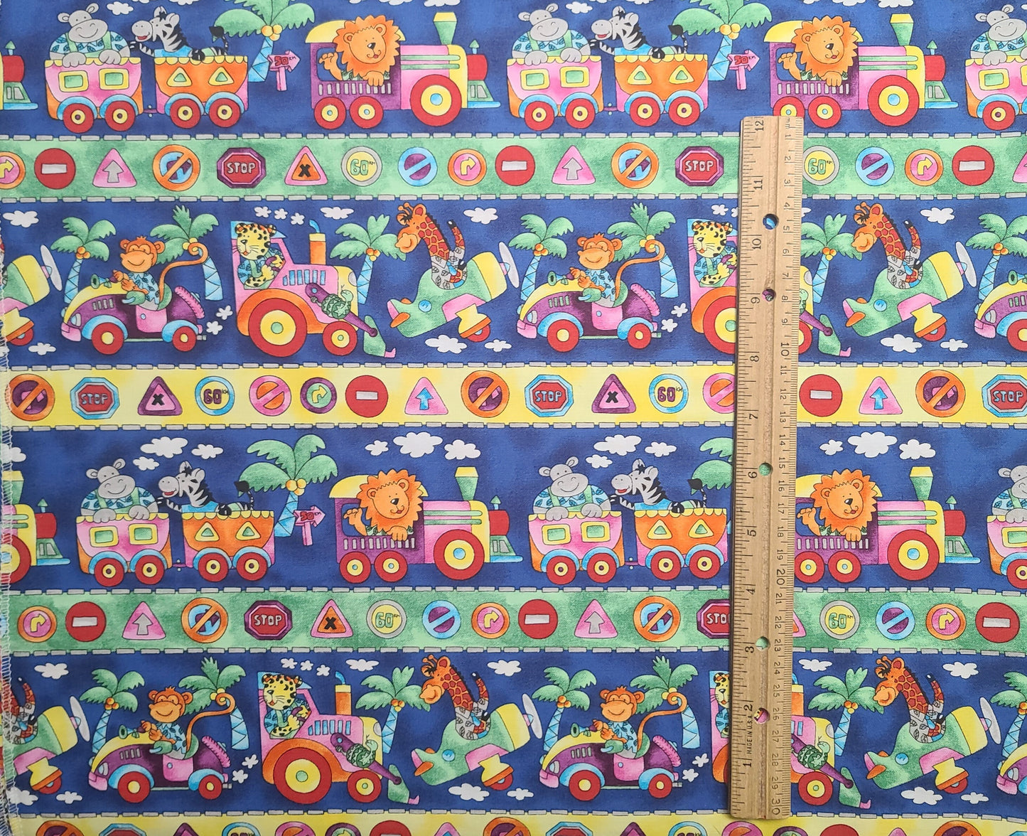 EOB - Hancock Fabrics - Brightly Colored Cartoon-Style Animal Train Border Print Fabric