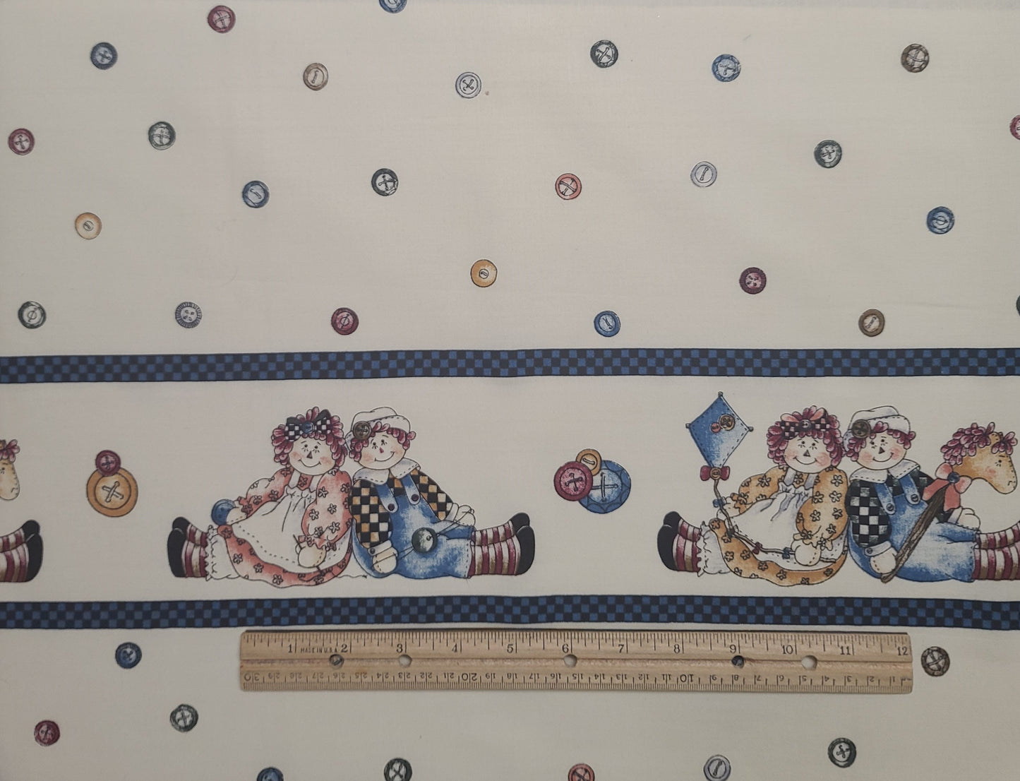 EOB - Dianna Marcum for Marcus Brothers Textiles Inc - Cream Fabric / Single Border Rag Doll Print / Scattered Buttons