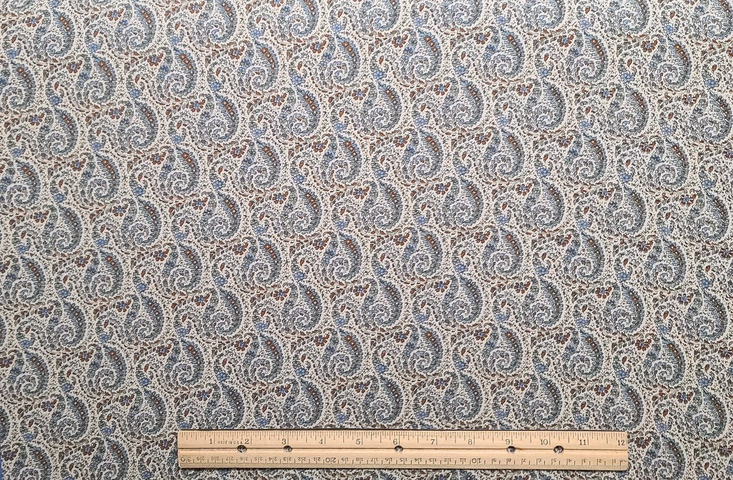 Brittany by RJR Fashion Fabrics - Cream Fabric / Vintage Blue, Rust, Gold Paisley Flower Print