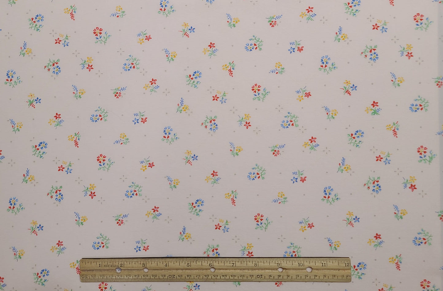 Pale Pink Fabric with Faux Eyelet Detail - Tossed Flower Print - Red, Blue, Yellow, Green - Selvage to Selvage Print