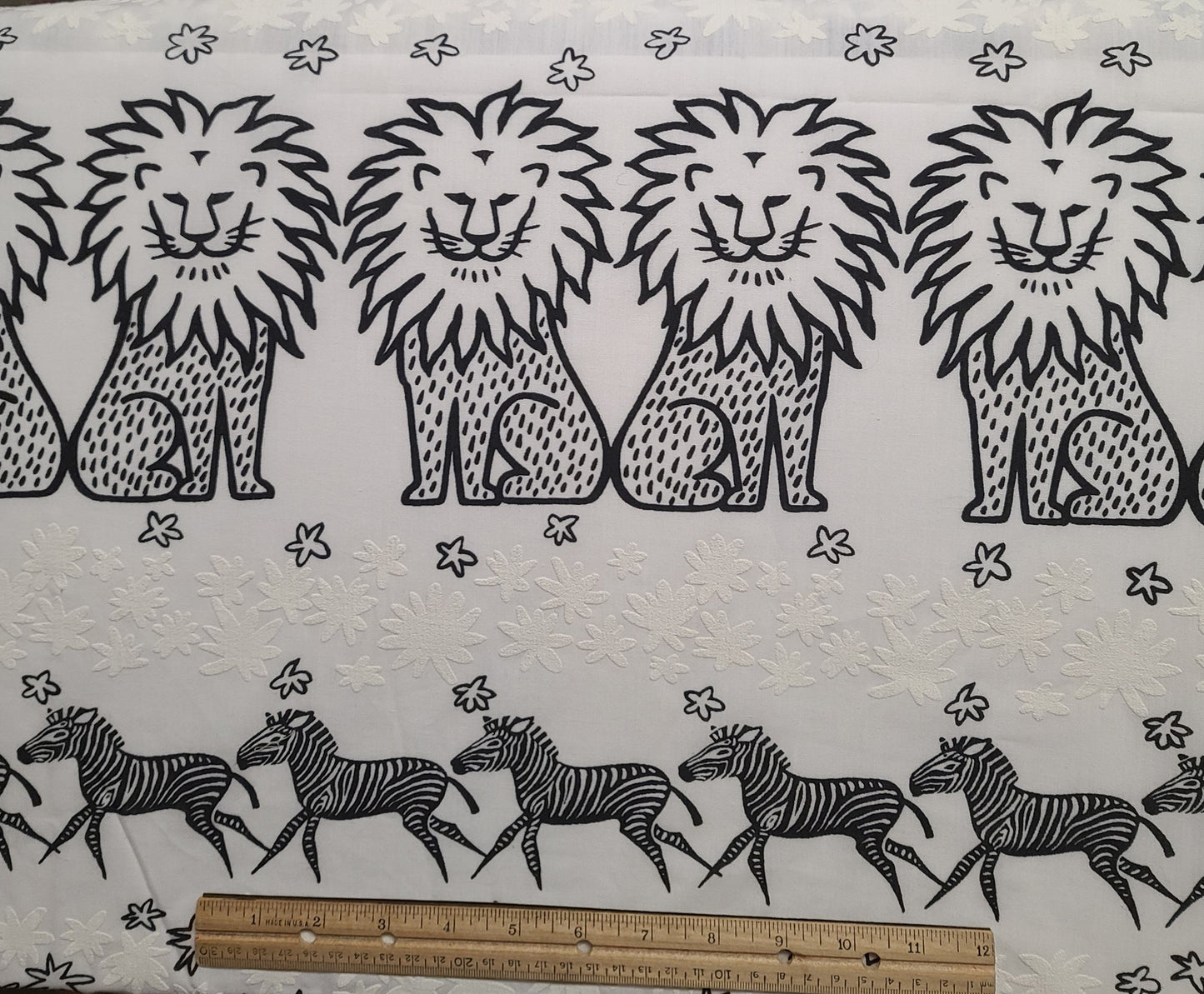 60" WIDE Birchwood Fabrics Inc-White Fabric/Black Lion, Giraffe, Zebra, Flower Horizontal (Selvage to Selvage) Stripes / White Raised Flower