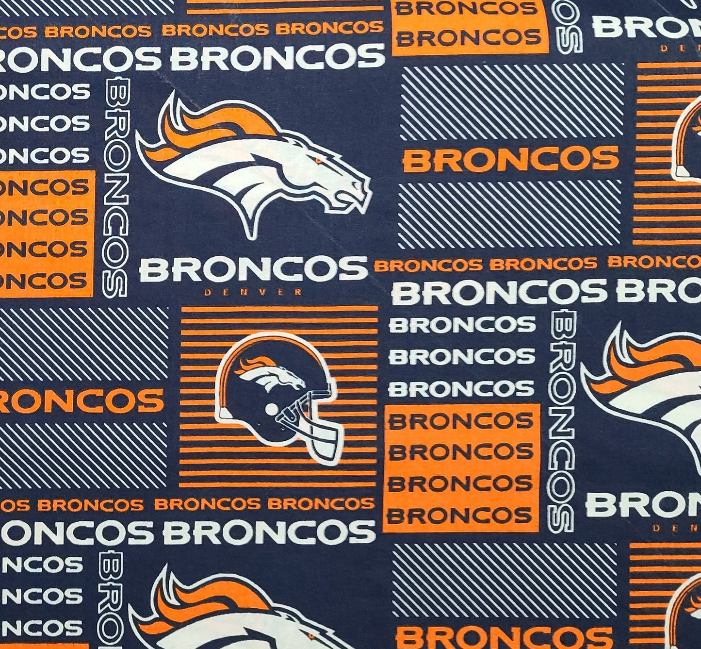 56" WIDE 2013 NFL #6422 - Dark Blue Fabric / Orange and White Denver Broncos Football Print Fabric