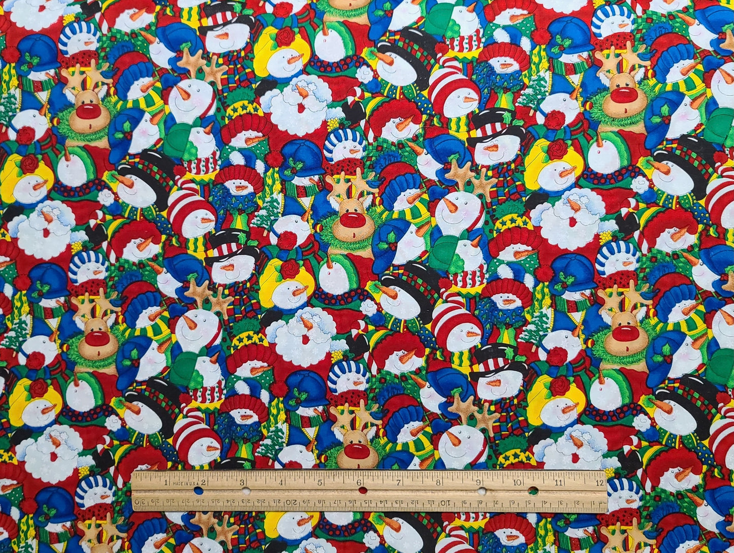 KidStuff Snowflakes Cheri L Strole SSI - Brightly Colored Allover Snow People Print Fabric / Reindeer, Snowmen, Snow Santa