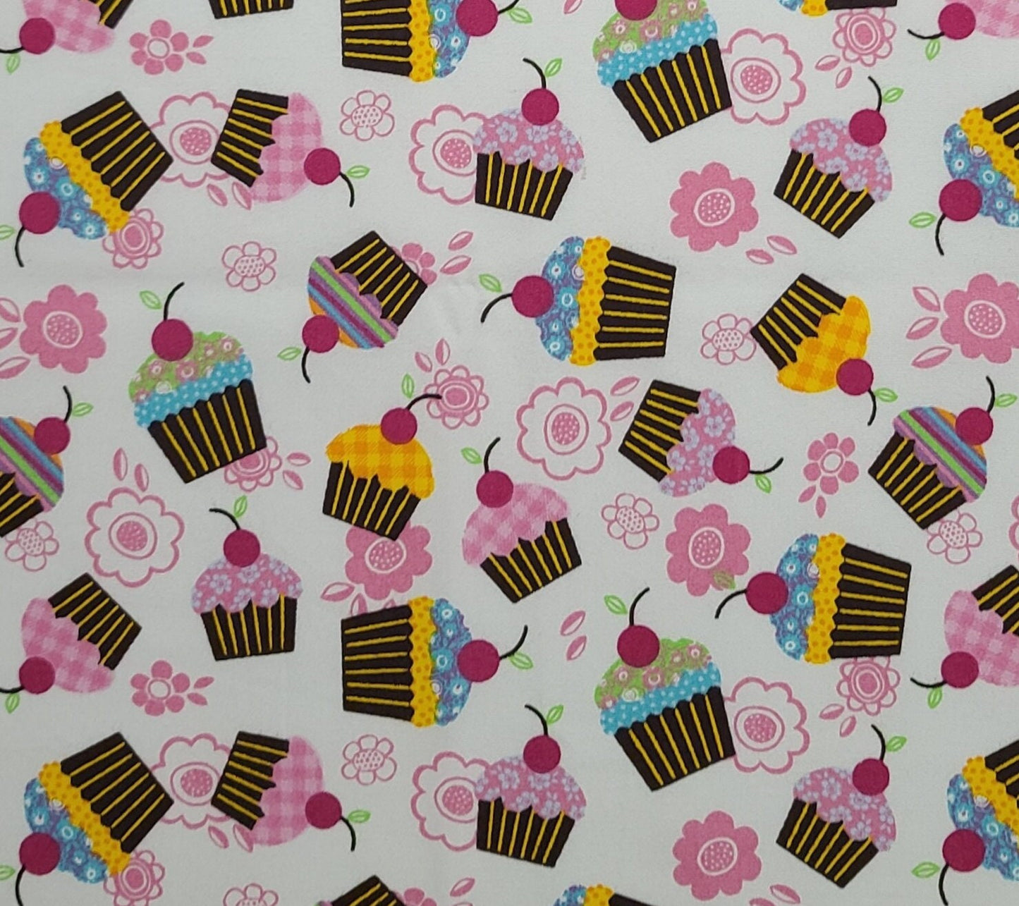 JoAnn Fabrics - White Fabric / Tossed Flower and Cupcake Print / Brown, Yellow, Pink