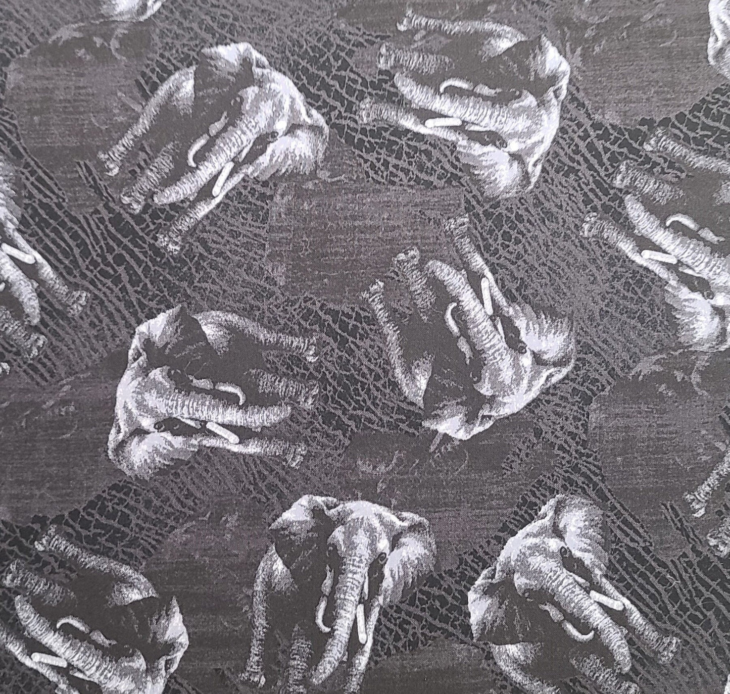 Serengeti by Fabri-Quilts Inc Patt 1024 - Black and Gray Tonal Fabric / White Elephant Print