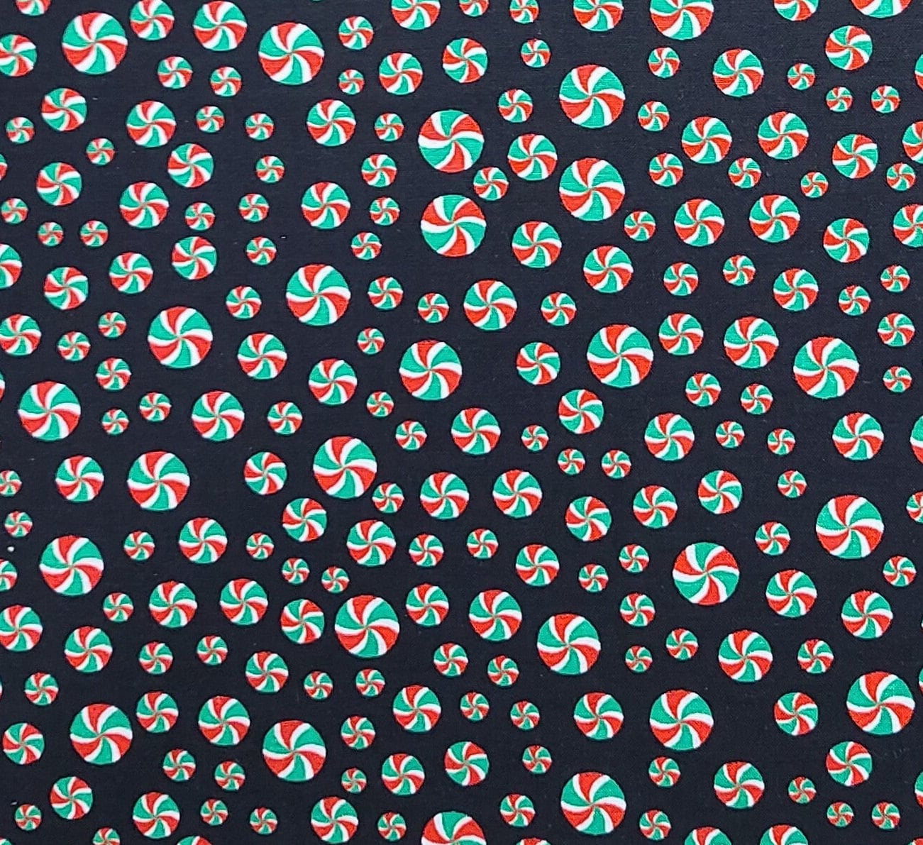 JoAnn Fabrics - Black Fabric / Red, White, Green, Peppermint Twist Candies Print