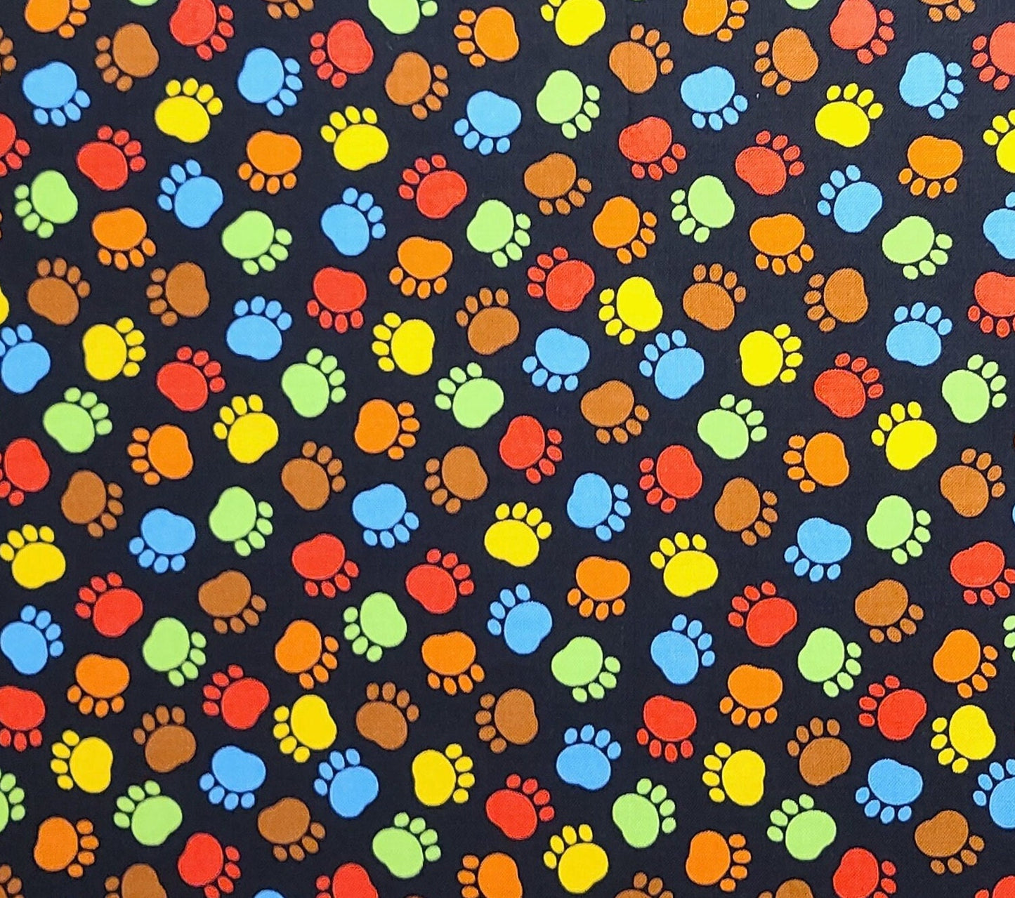 Timeless Treasures Fabrics of Soho Patt#DOG-C7120 - Black Fabric / Light Blue, Bright Green, Yellow, Red Paw Print