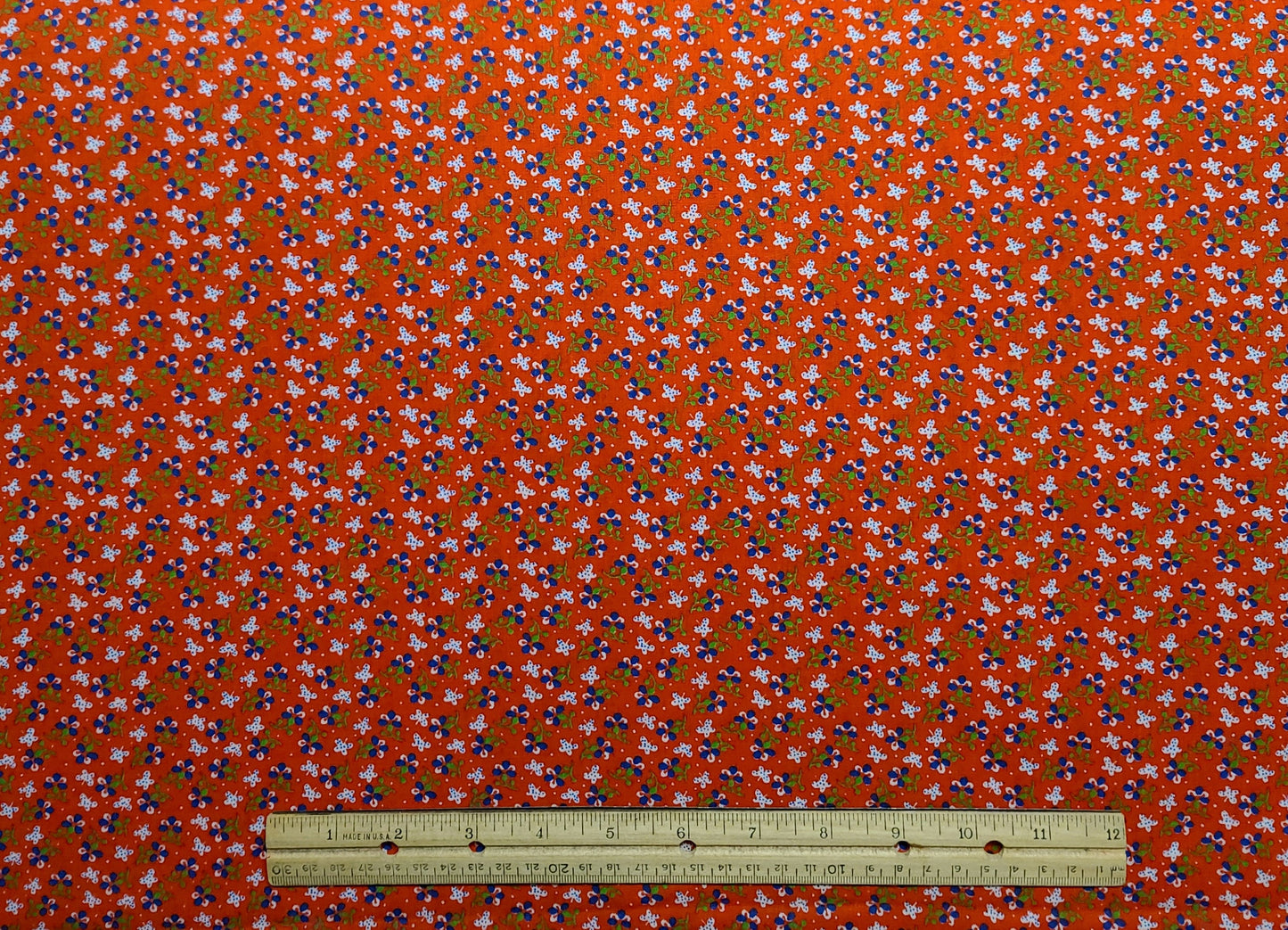 Red Fabric / Blue, White, Green Flower Print - Selvage to Selvage Print