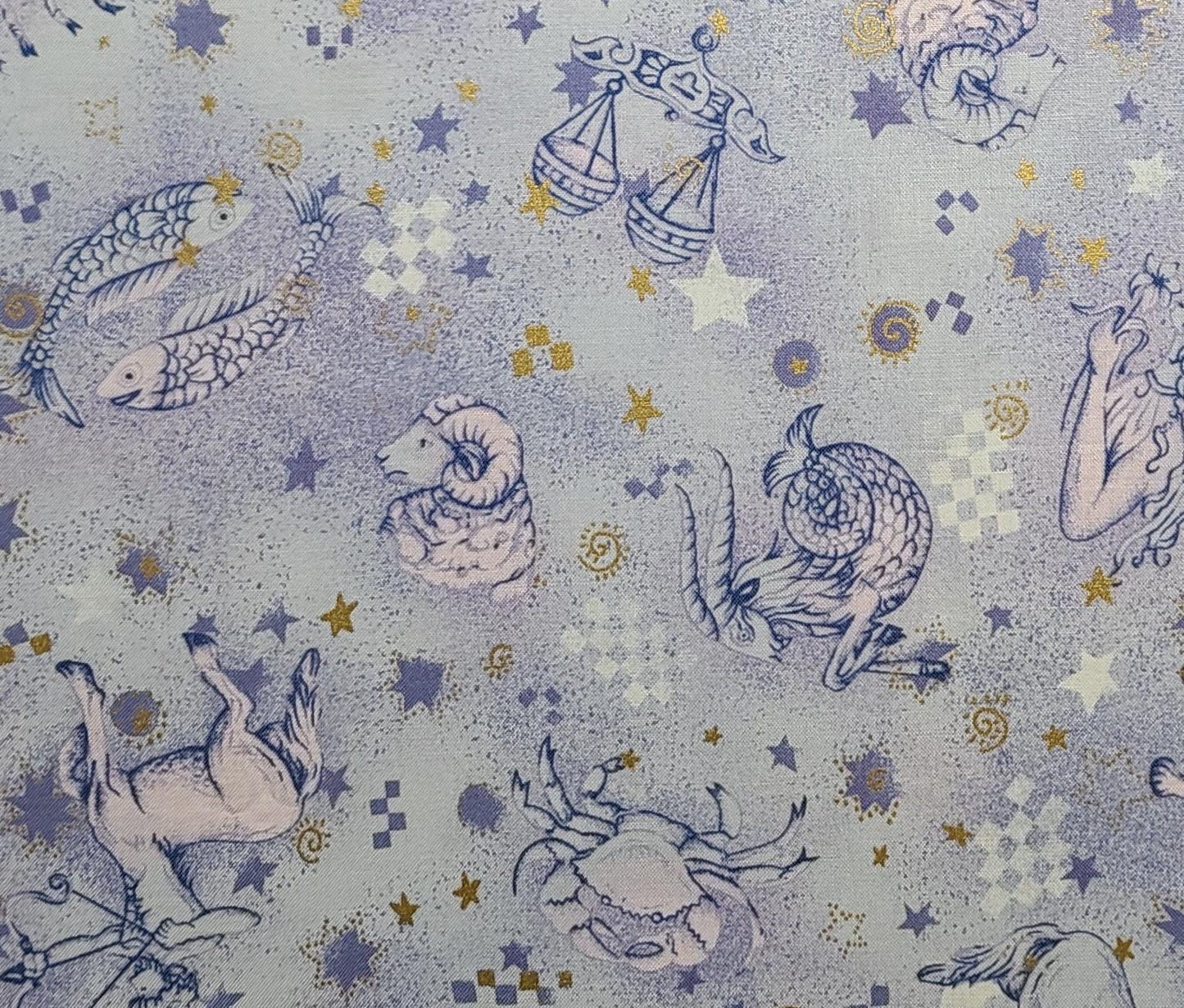 Quilters Only #5873 Springs Industries - Pale Blue and Lavender Tonal Fabric / Tossed Zodiac Signs Print