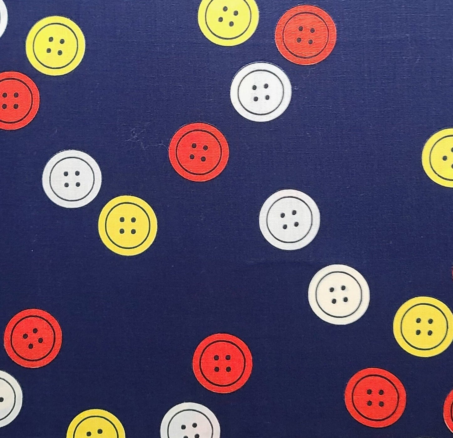 Crantex Fabrics - Dark Blue Fabric / Large White, Red, Yellow Scattered Button Print