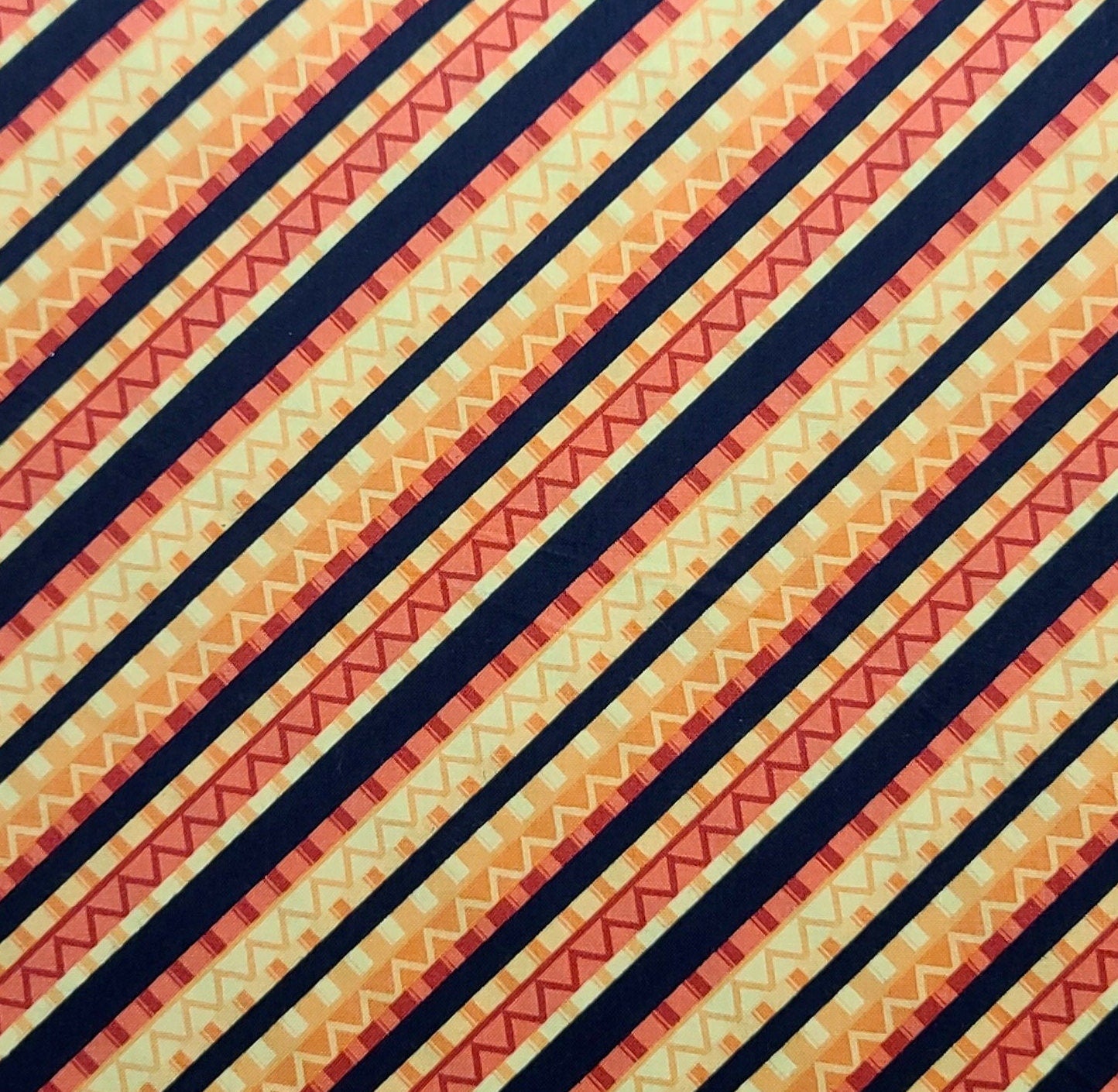 Caliente Peppers TRD Portfolio WP - Black, Yellow, Gold, Red, Coral Diagonal Stripe Fabric