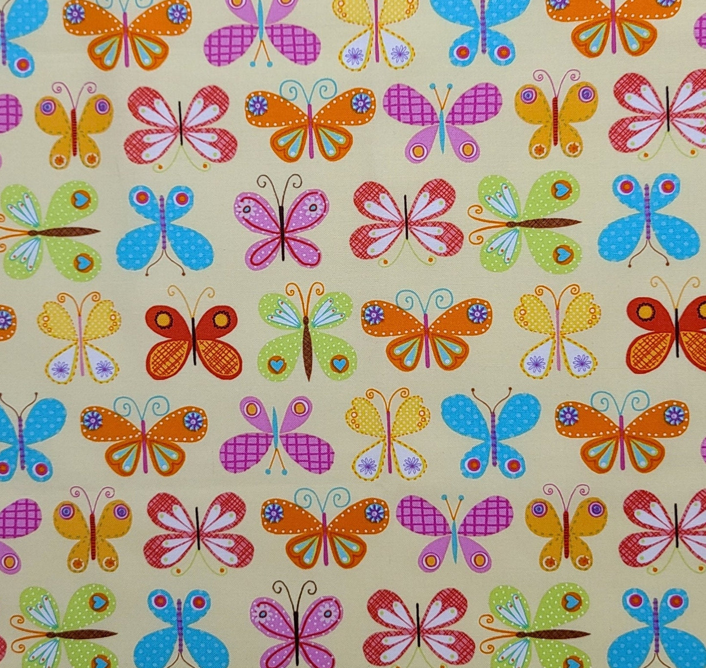 EOB - Timeless Treasures Fabrics SoHo Patt#BUTTERFLY-C3750 - Pale Yellow Fabric / Brightly Colored Pink, Orange, Blue, Green Butterfly Print.