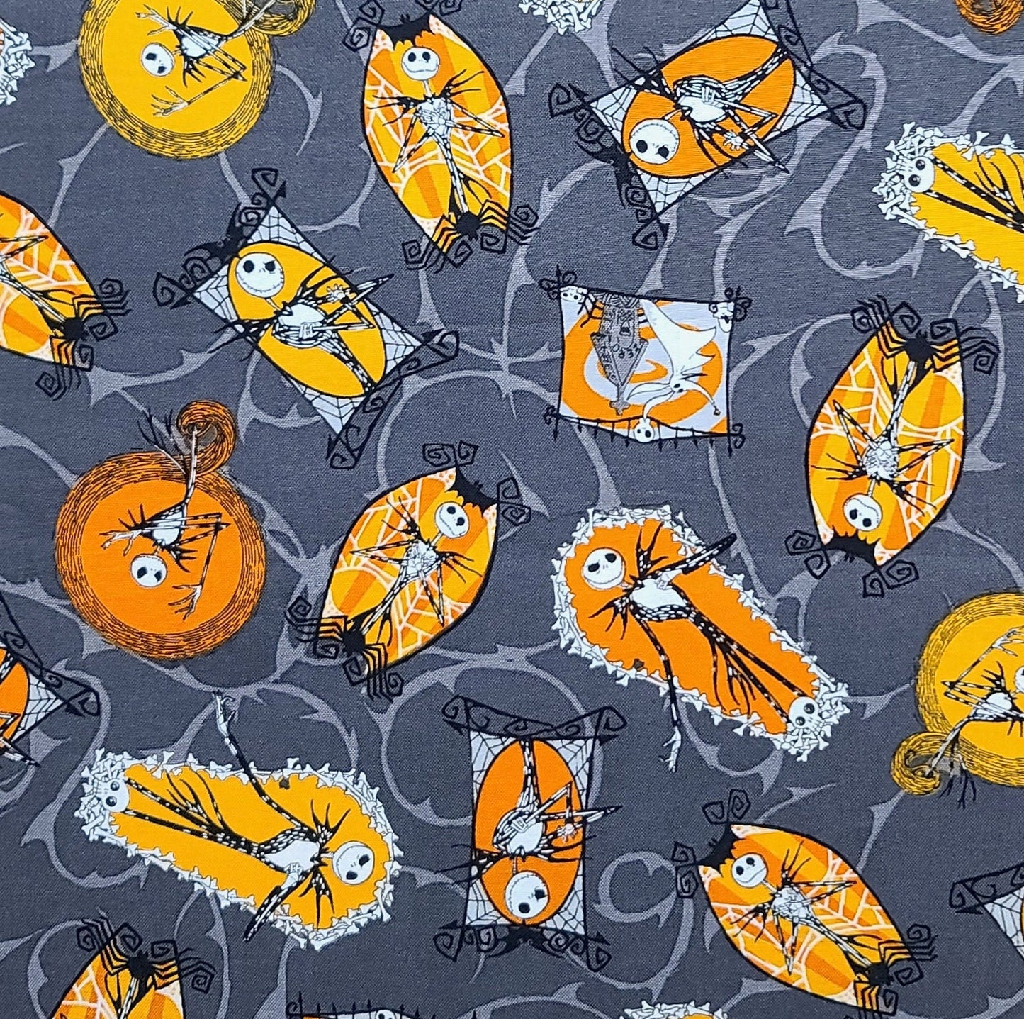 EOB - CP53988 Disney Nightmare Before Christmas Jack Disney Springs Creative 2015-Dark Mushroom Brown Fabric/Orange, Gold, Gray Badge Print