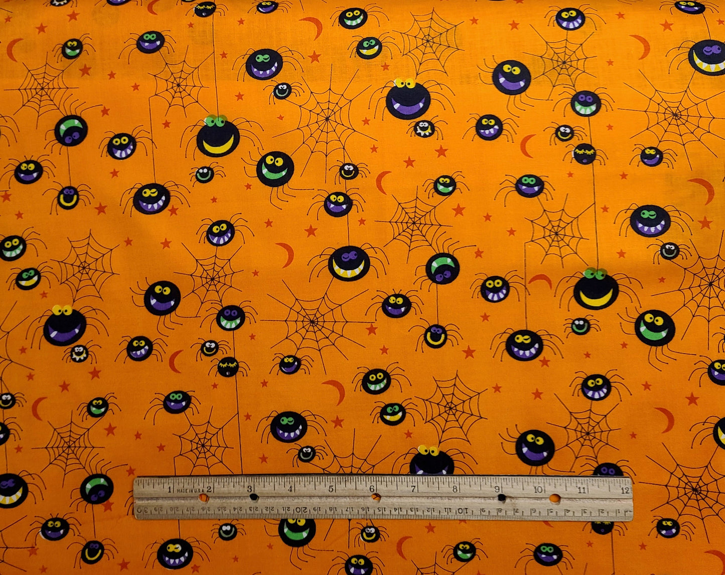 EOB - Orange with Tonal Stars and Moons Fabric / Black Cartoon Spider and Web Print / Purple, Yellow, Green - Selvage to Selvage Print