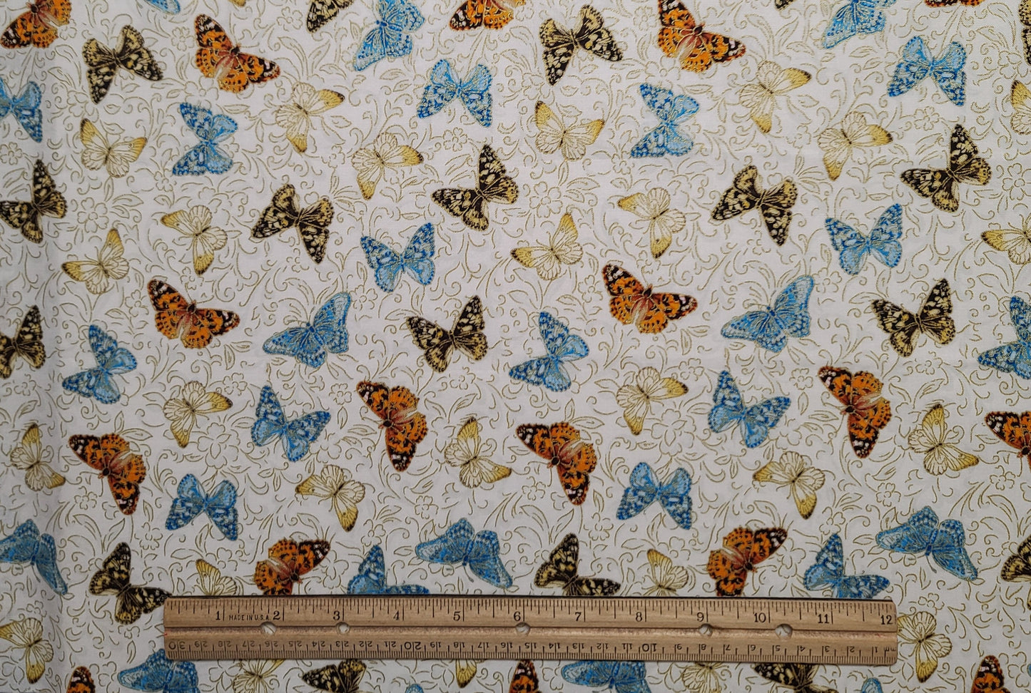 EOB - Benartex Pattern #BUTTERFLYGARDEN-CM8934 - White Fabric / Teal, Black, Orange, Gold Butterfly Print / Gold Metallic Accents