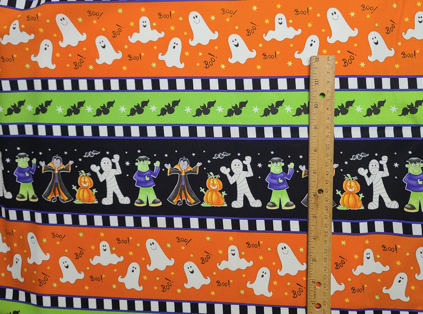 Here We Glow Delphine Cubitt for Henry Glass & Co Inc Pattern #9543G - Halloween Border Stripe Fabric / Cartoon Mummy, Vampire, Bats, Ghosts