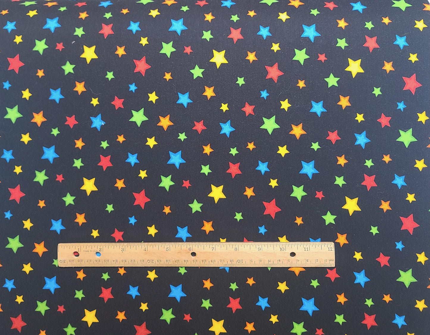 Star Fall Wilmington Prints - Black Fabric / Brightly Colored Tossed Star Print