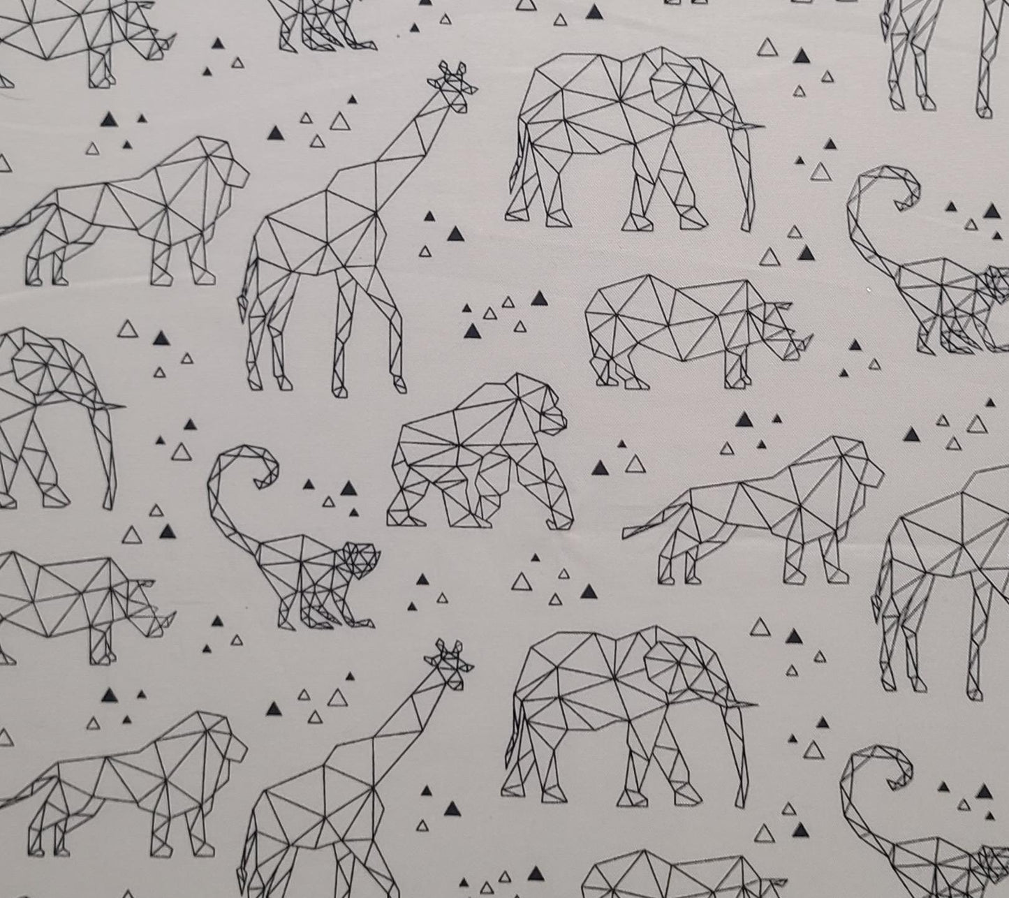 Zoometrix 22412 Deborah Edwards Northcott - White Fabric / Black Geometric Ape, Monkey, Elephant, Lion, Giraffe Print