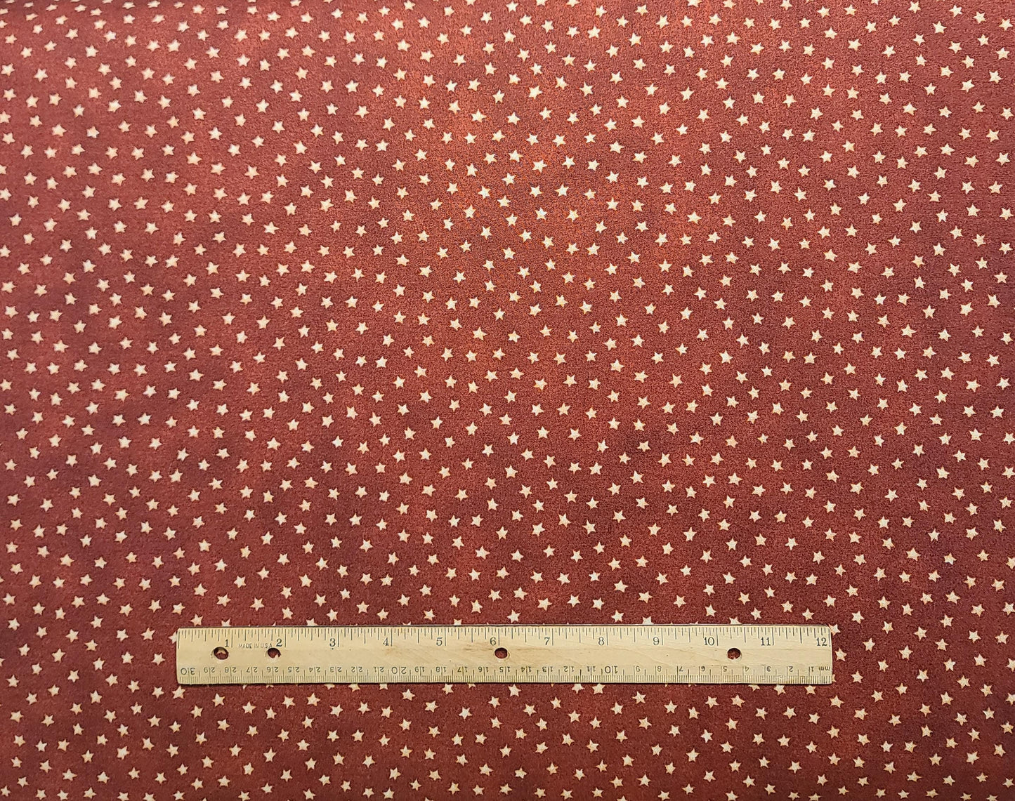 Balloon Race David Carter Brown for SSI - Dark Red Tonal Fabric / Gold Star Print