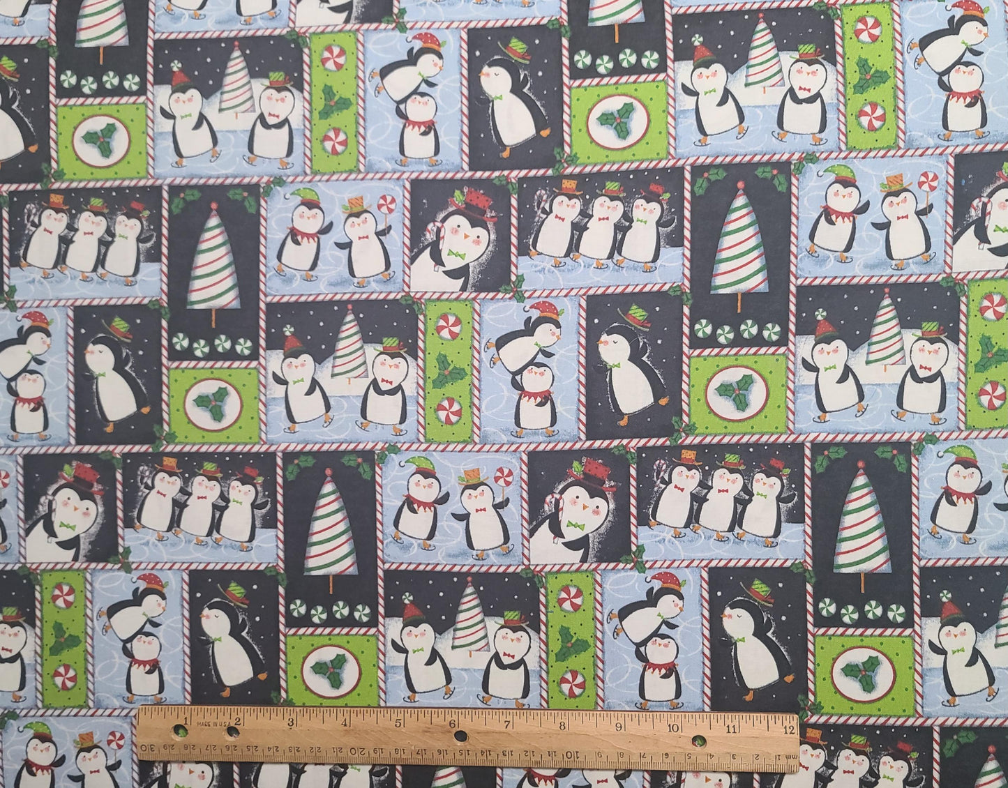 Keepsake Calico JoAnn Fabrics - Cartoon Penguin Christmas Print Block Fabric / Candy Cane Sashing