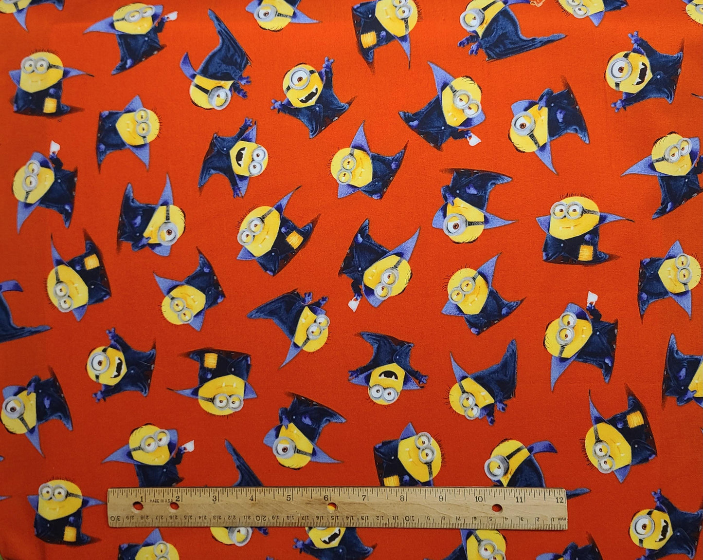 Minions Universal Studios Quilting Treasures - Red Fabric / Minion Vampire Print