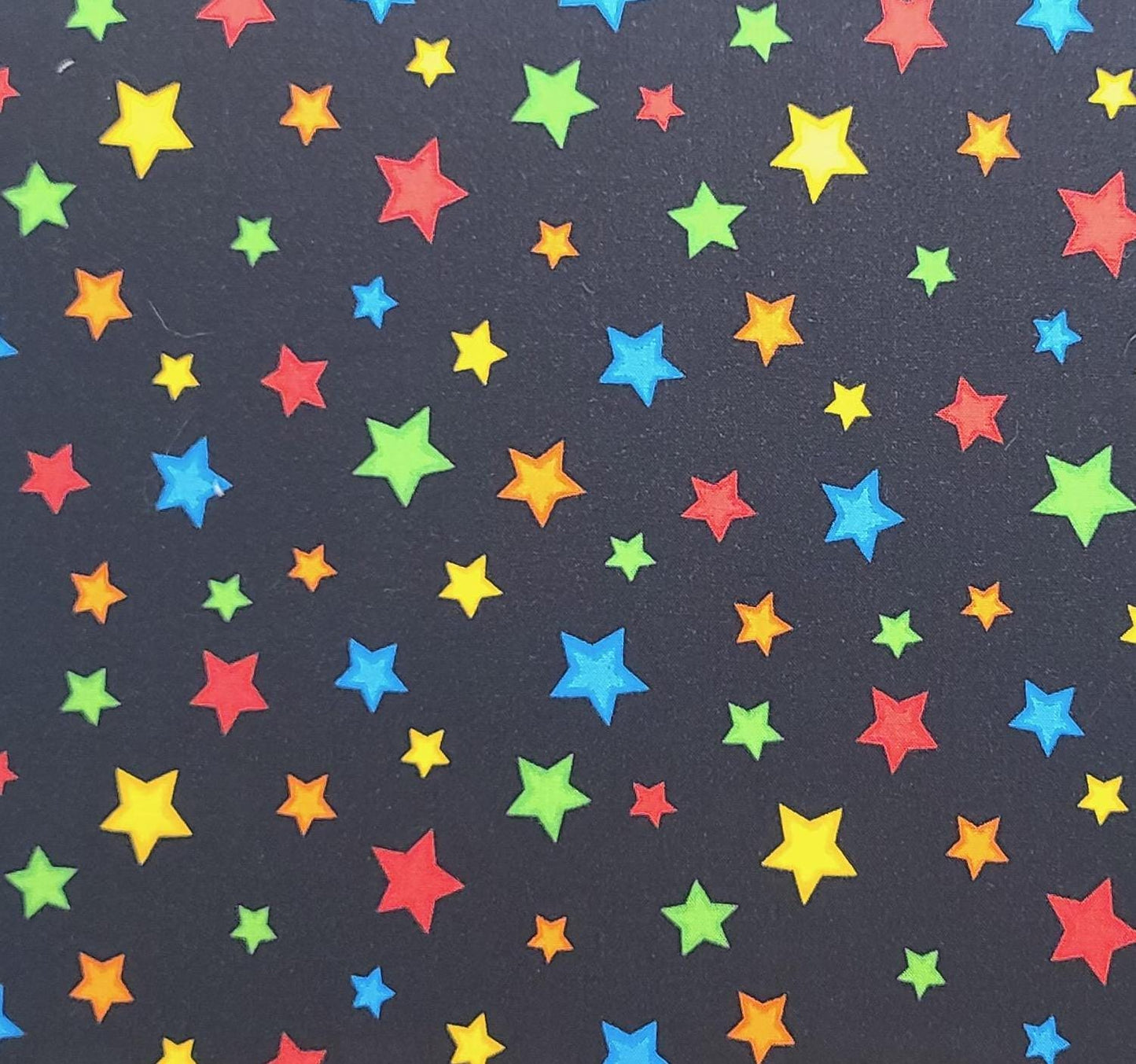 Star Fall Wilmington Prints - Black Fabric / Brightly Colored Tossed Star Print