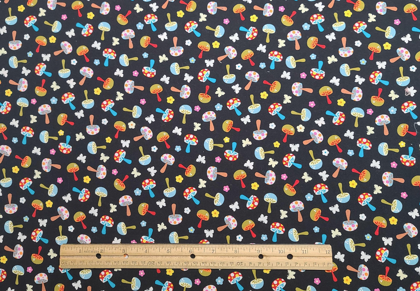 Michael Miller Fabrics Inc Patt#CX4329 Mini Mushrooms - Black Fabric / Brightly Colored Tossed Mushroom, Flower, Butterfly Print