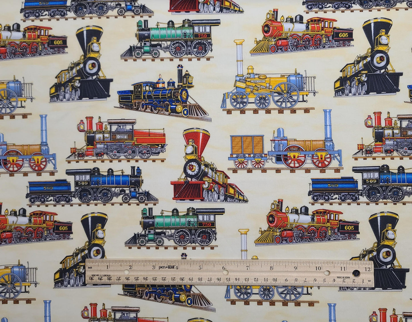 EOB - Timeless Treasures Fabrics Inc Pattern DAN-C7174 - Pale Gold Tonal Fabric / Locomotive Print