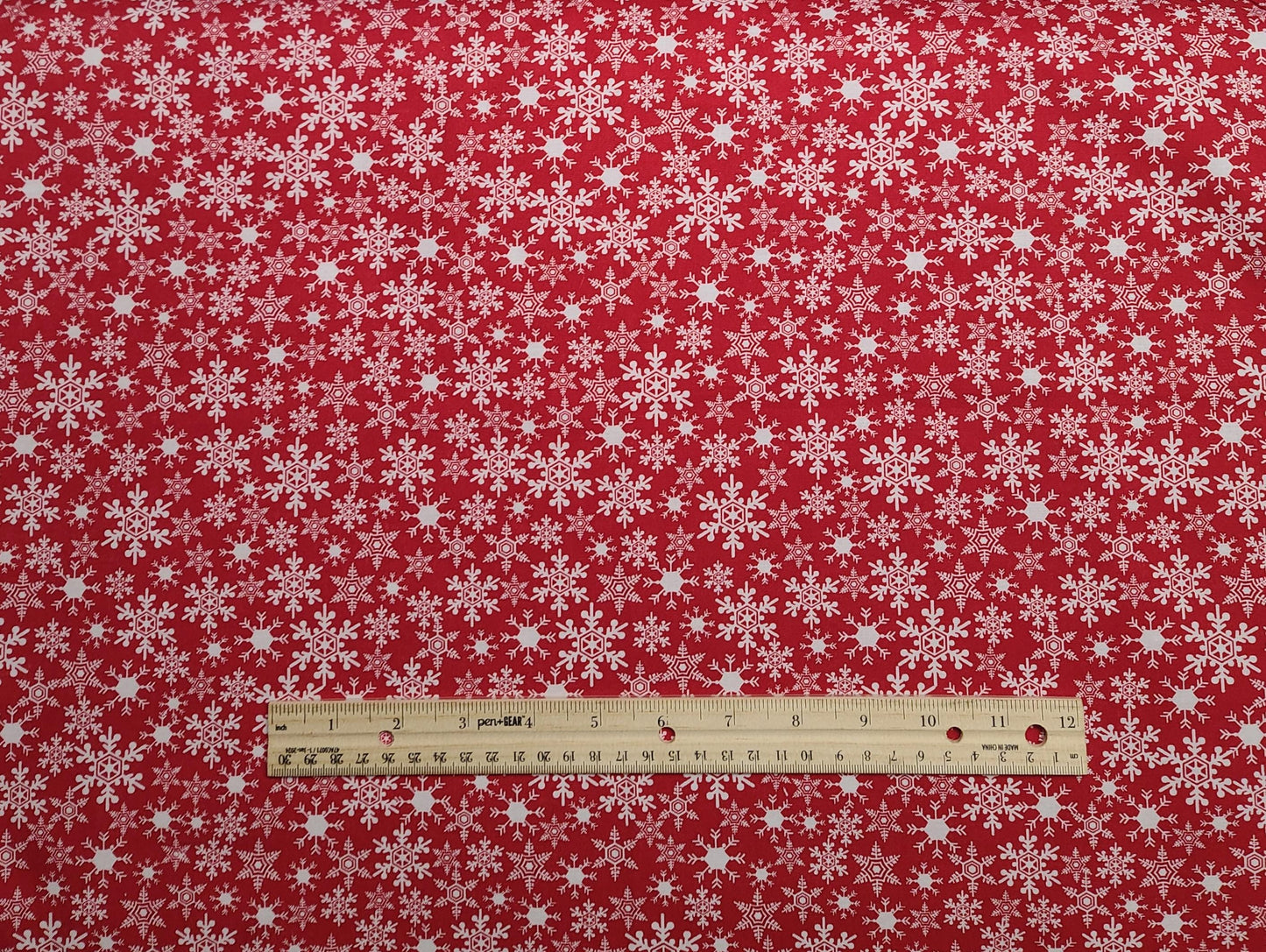 JoAnn Fabrics - Red Fabric / Packed White Snowflake Print