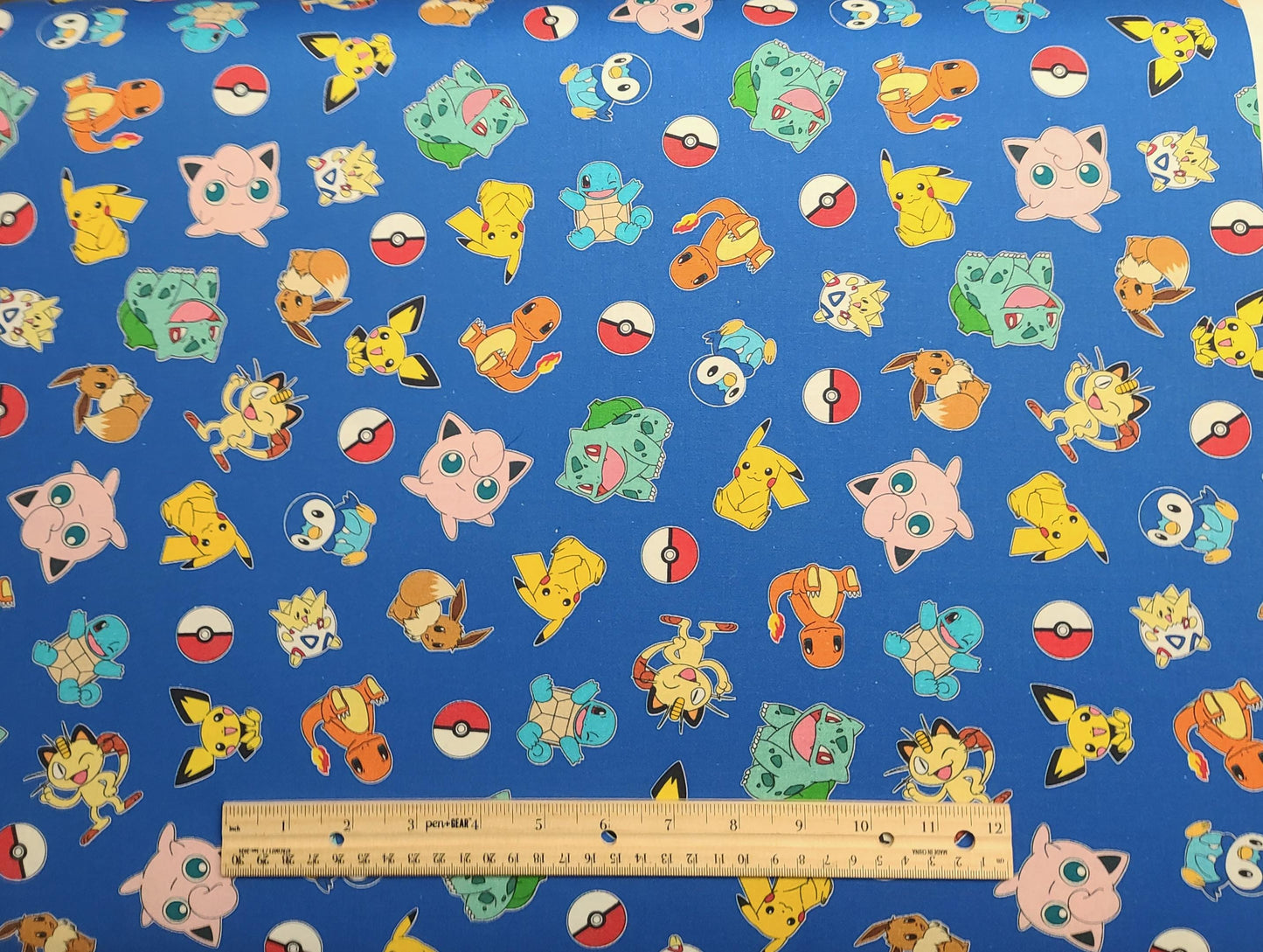 EOB - Pokemon Design #74312 2020 Nintendo Robert Kaufman - Medium Blue Fabric / Tossed Pokemon Characters Print