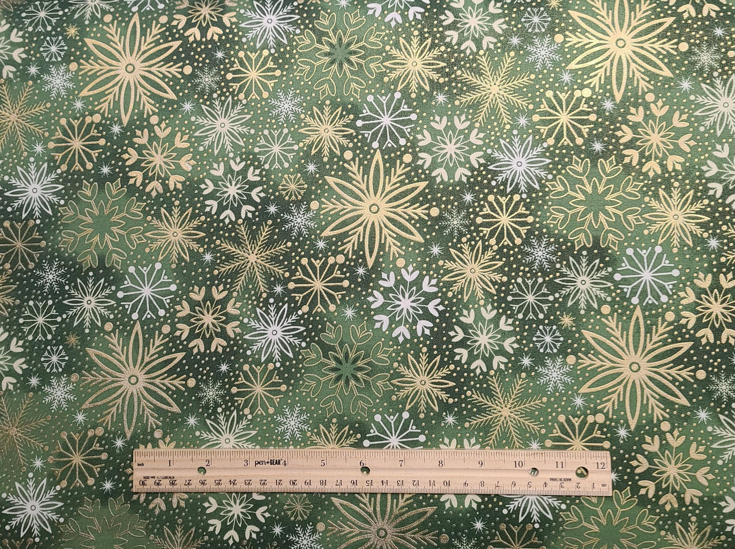 JoAnn Fabrics - Green Tonal Fabric / White and Gold Metallic Snowflake Print