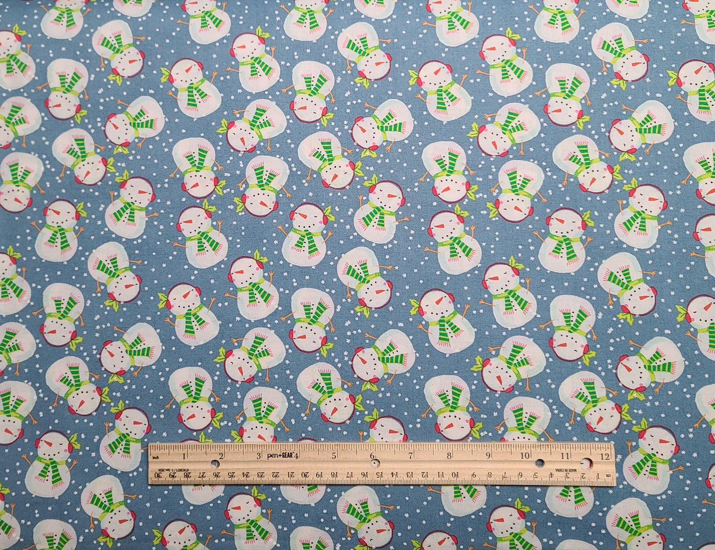 JoAnn Fabrics - Light Blue Fabric / Tossed Snowman and Snowflake Print