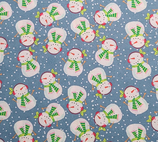 JoAnn Fabrics - Light Blue Fabric / Tossed Snowman and Snowflake Print