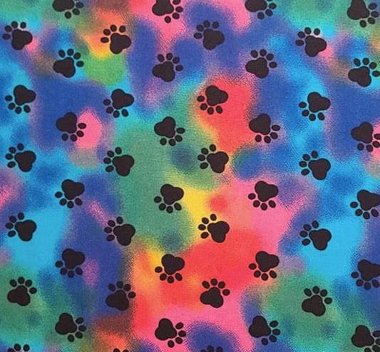 JoAnn Fabrics - Rainbow Swirl Fabric / Black Paw Prints