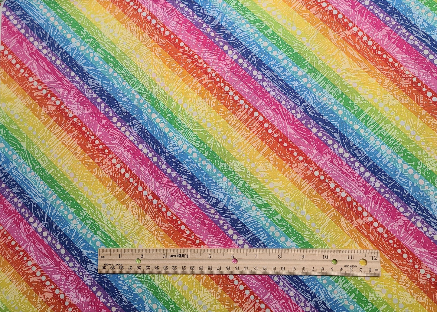 Keepsake Calico JoAnn Fabrics - Rainbow Diagonal Stripe with White Dot Fabric