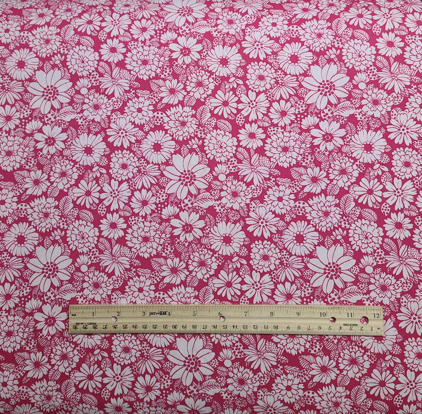 J Manes Co Inc - 36" WIDE Raspberry Print Fabric / White Flower Print