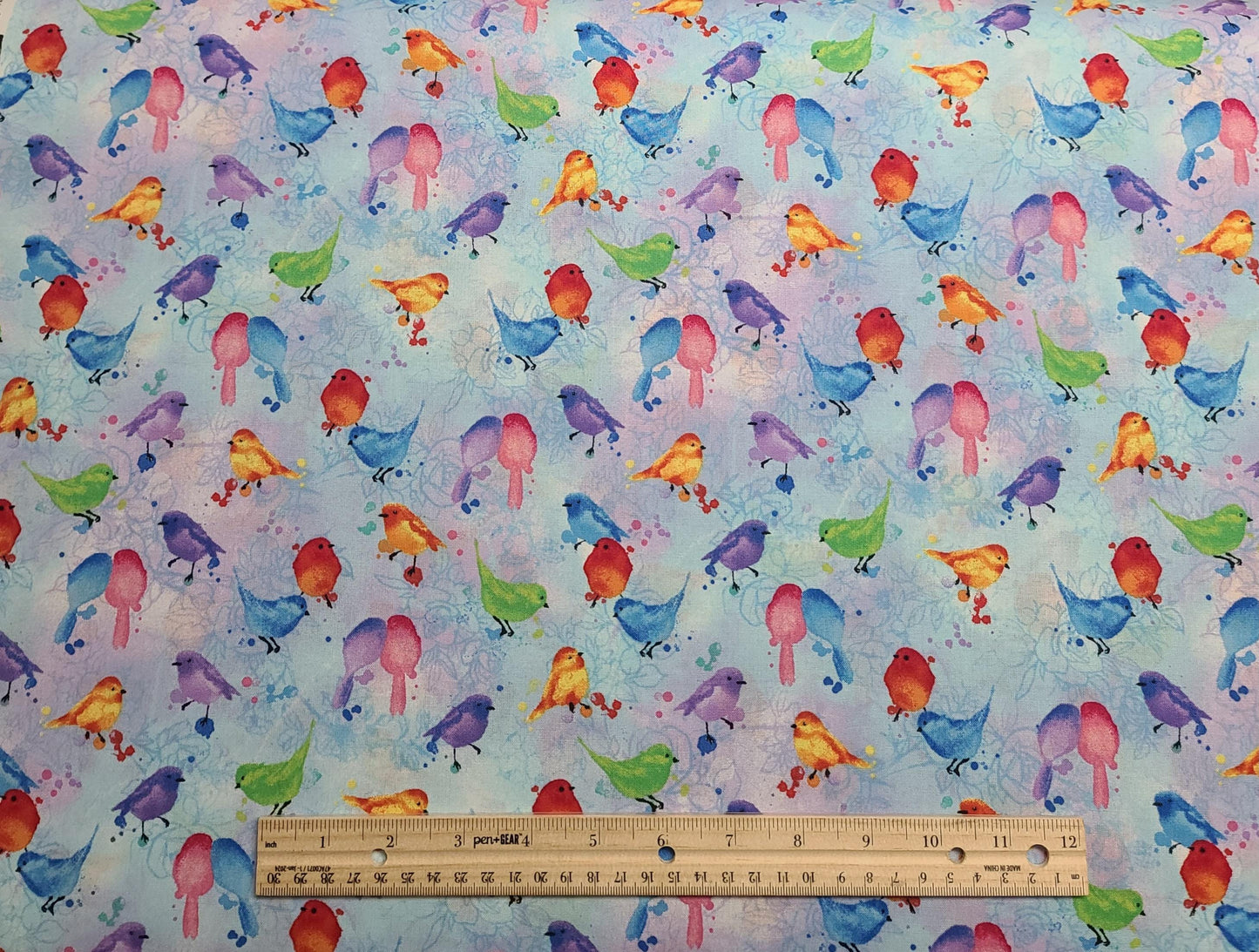 Hi-Fashion Fabrics Inc 7942 - Pale Blue and Lavender Fabric / Watercolor Style Pink, Purple, Bright Green, Blue Bird Print