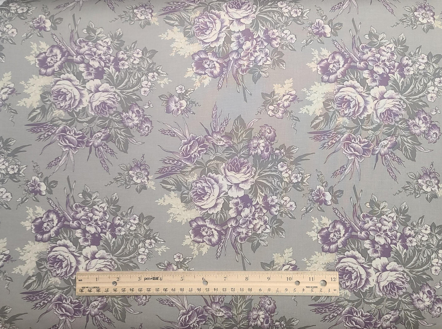 Putty & Mortar Marcus Fabrics Design 6752 - Putty Colored Fabric / Plum, White, Dark Putty-Colored Flower Bouquet Print