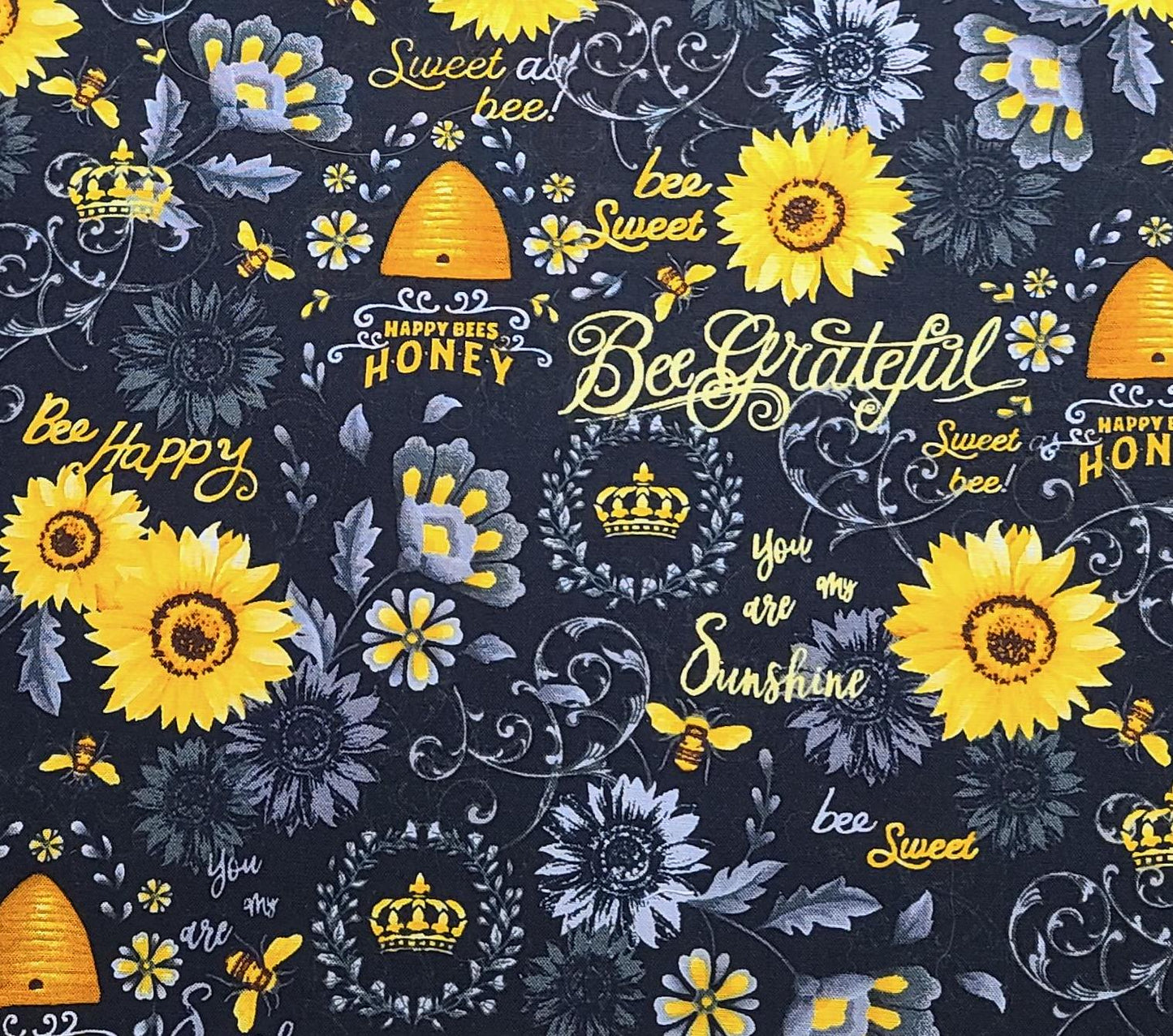 Hi-Fashion Fabrics 1436 - Black Fabric / Gray, Gold, Yellow Flower and Bee Print and Script