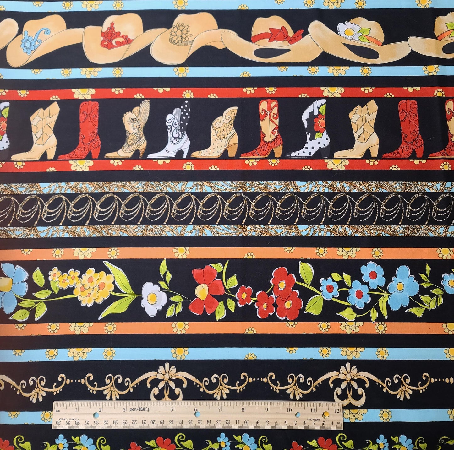 Whoa Borders Loralie Harris for Loralie Designs - Black Fabric / Red, Turquoise, Tan Hats, Boots, Flowers, Lariat Border Stripe Print