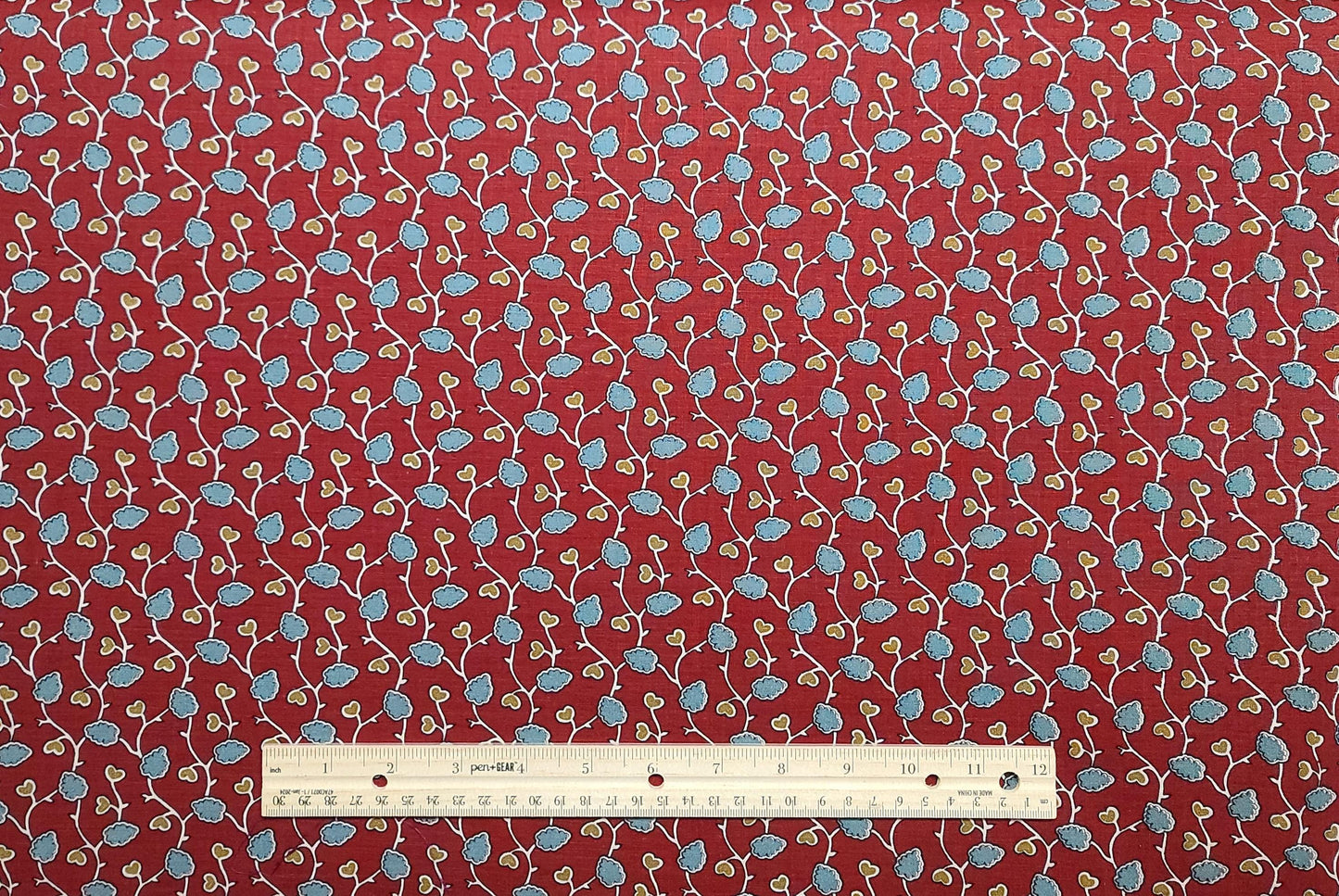 1987 Marcus Brothers Textiles Inc - Red Fabric / Green, White, Tan Leaf Print