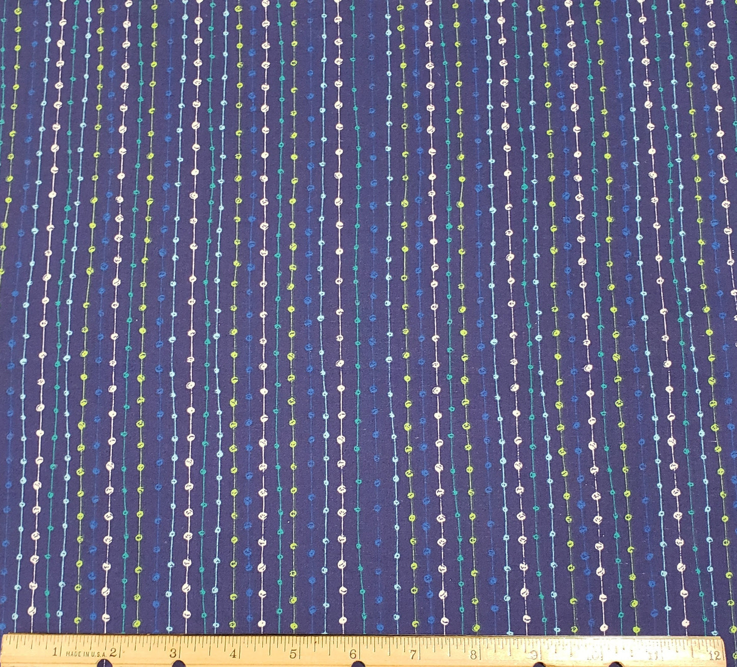 Dark Blue Fabric with "Beaded" Stripes in Aqua / Blue / Lime Green / White