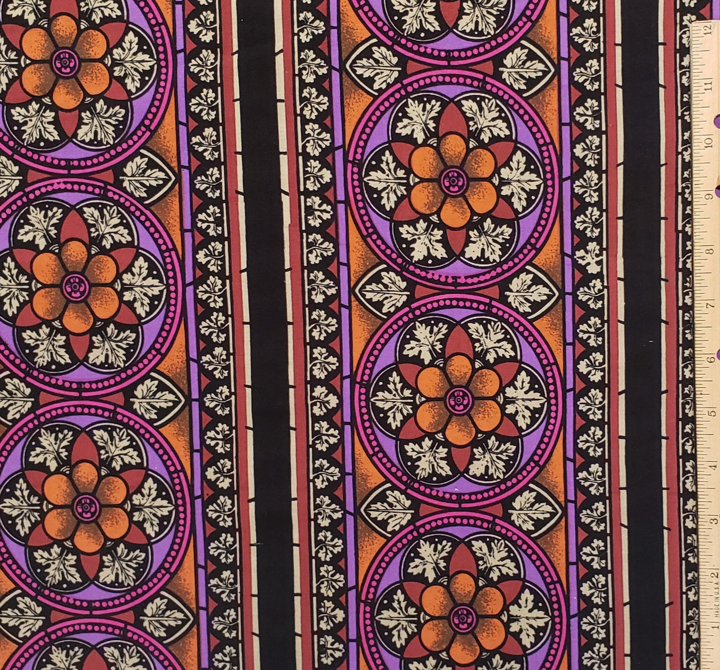 Mary Ellen Hopkins - Black Fabric / Rust, Purple, Orange Pattern - 42" WIDE FABRIC - Selvage only on one side