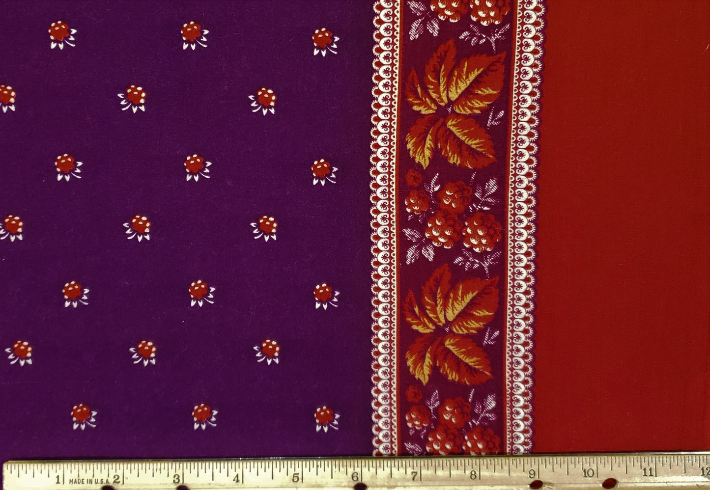 Autumn Single Border Fabric-Appr 3" Wide Rust Border on One Selvage/2-1/2" Rust and Plum Leaf & Berry Stripe/Scattered Berries on Dark Plum