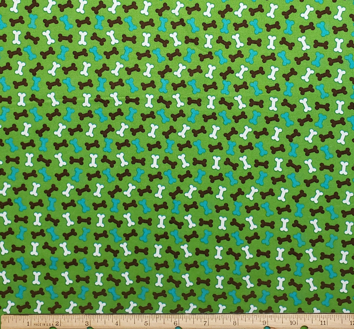 JoAnn Fabric - Green Fabric with Brown, White and Blue Dog Bone Print