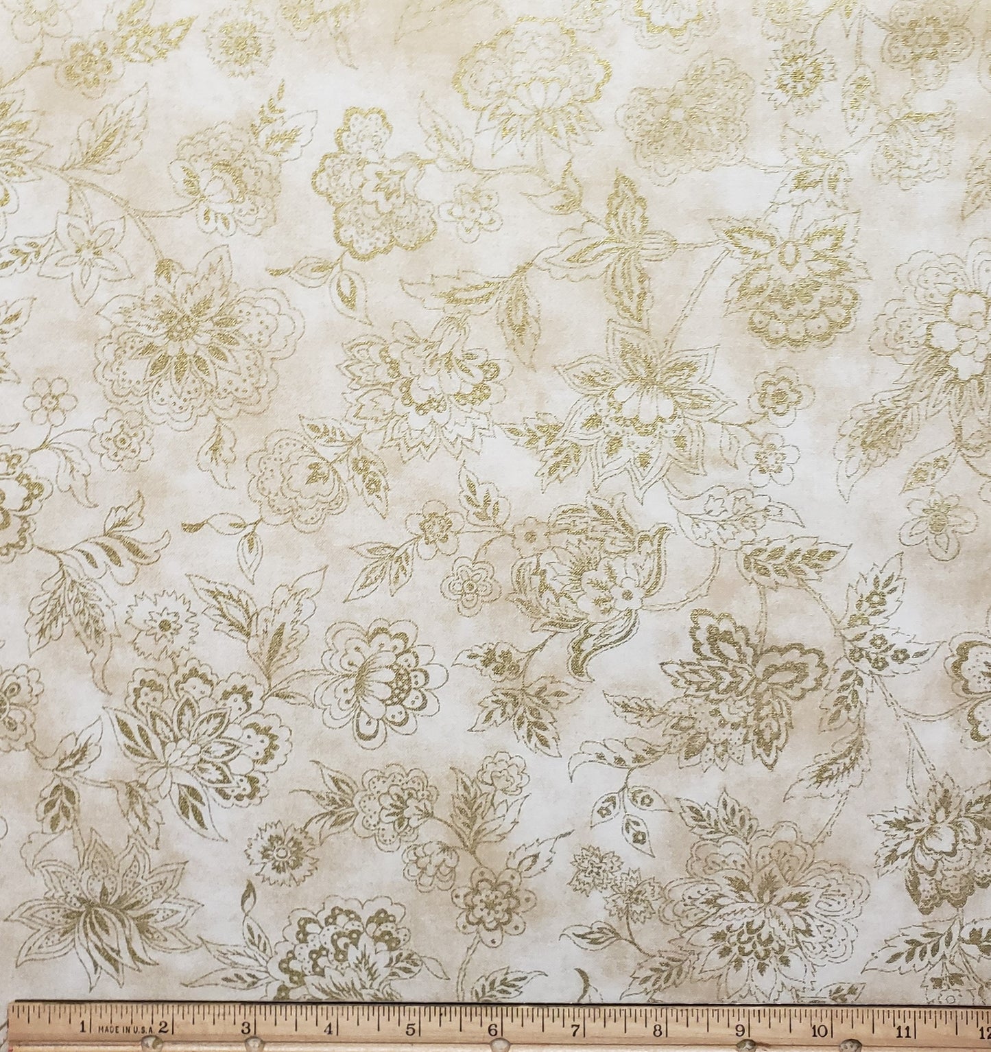 EOB - Mottled Tan Fabric with Larger Metallic Gold Flower Pattern - Selvage to Selvage Print