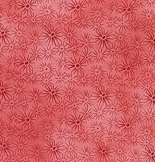 Designed by Beth Ann Bruske for David Textiles, Inc. - Bright Mottled Coral Fabric with Tonal Starburst Print