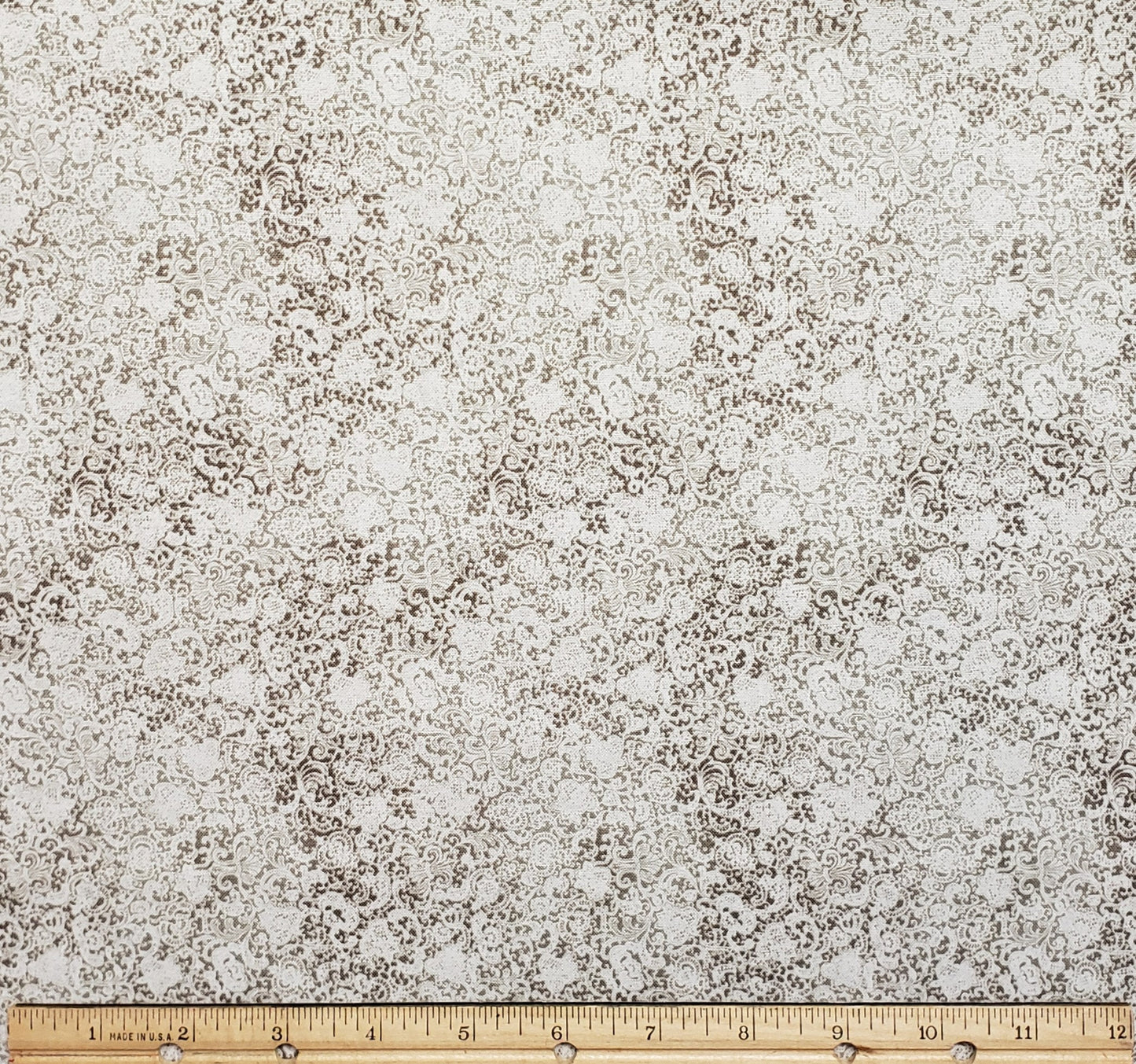Designed and Produced Exclusively for JoAnn Fabric and Craft Stores - Printed in South Korea - White Fabric with Brown and Tan Lace Print
