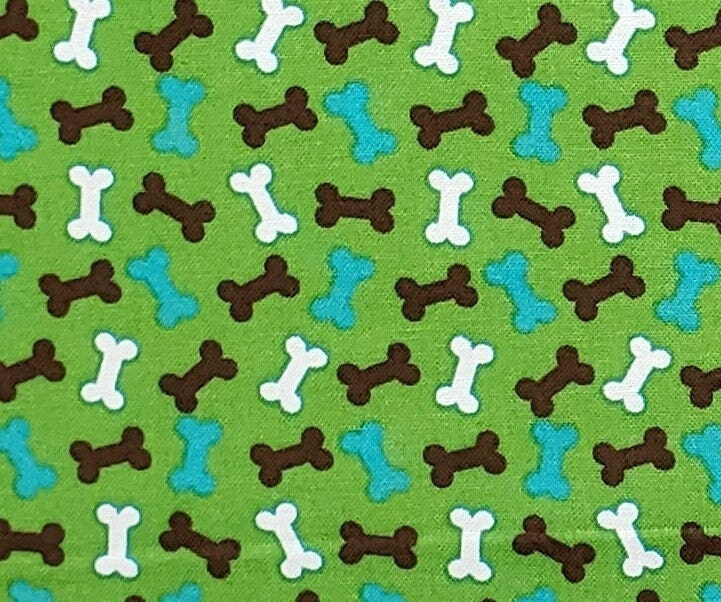 JoAnn Fabric - Green Fabric with Brown, White and Blue Dog Bone Print